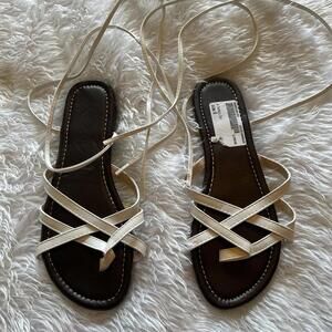Brown and white lace up sandals